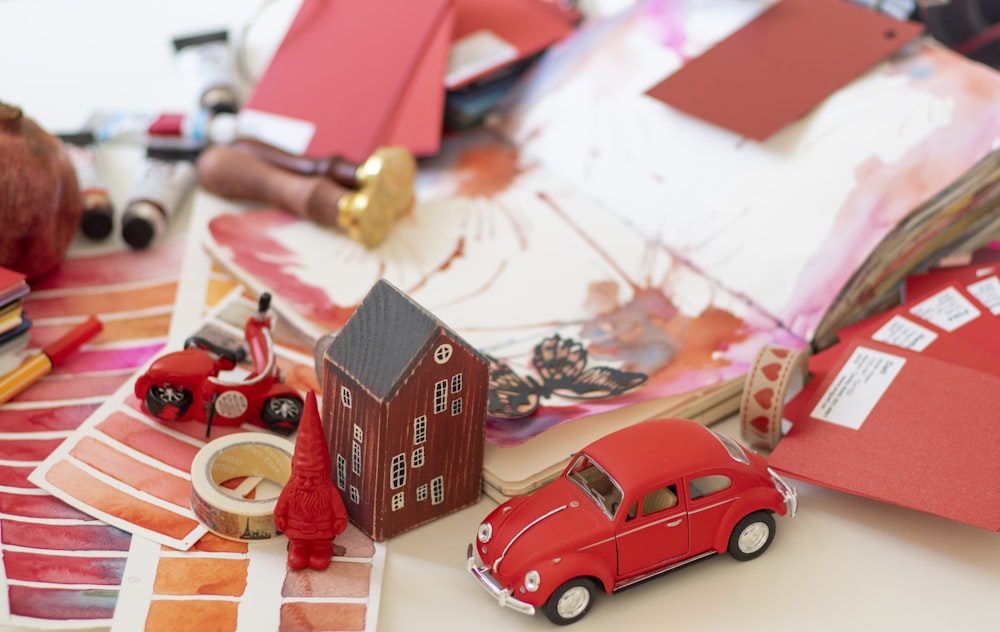 /red-and-white-car-scale-model